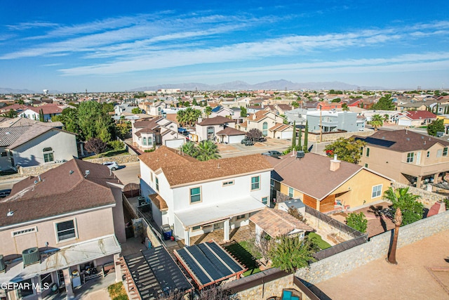 birds eye view of property featuring a mountain view