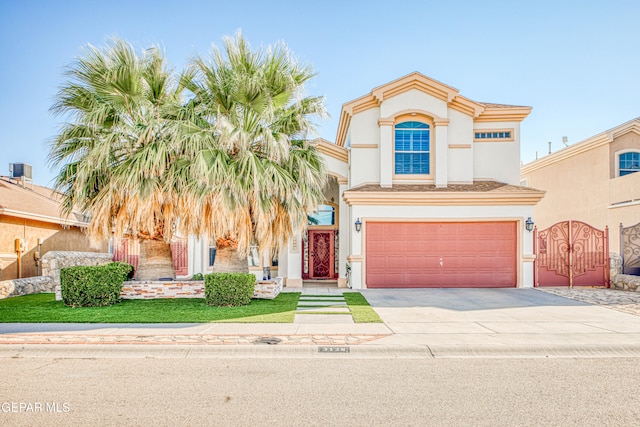 mediterranean / spanish-style home featuring a garage