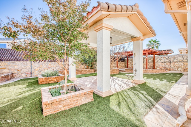 view of yard with a patio area