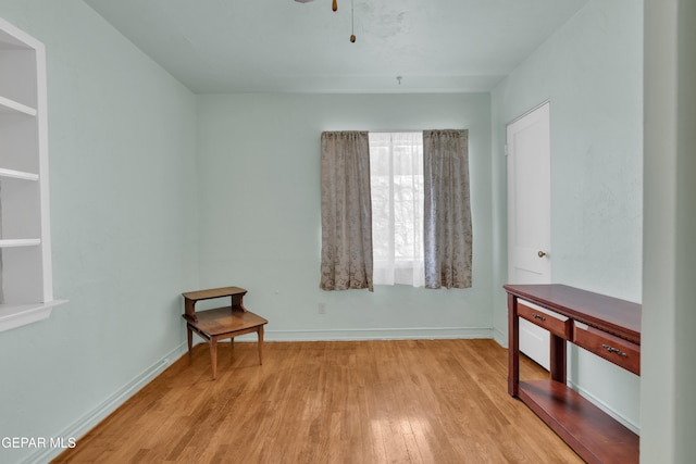 empty room featuring light hardwood / wood-style floors and ceiling fan