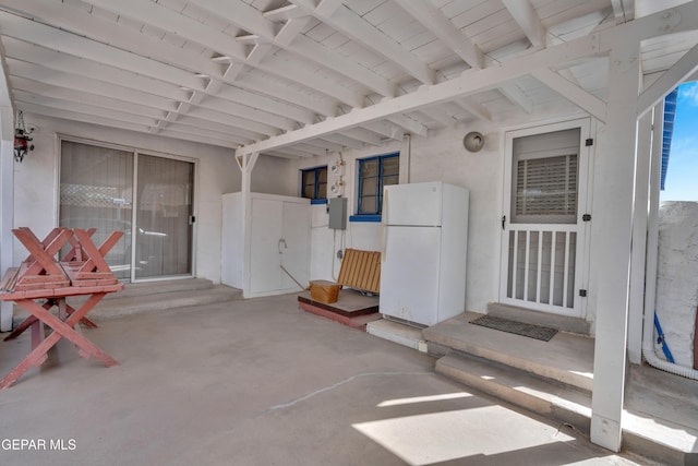 view of patio / terrace featuring electric panel