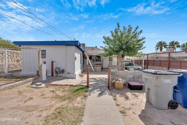 view of front of property featuring a patio area