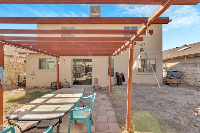 view of patio featuring a pergola