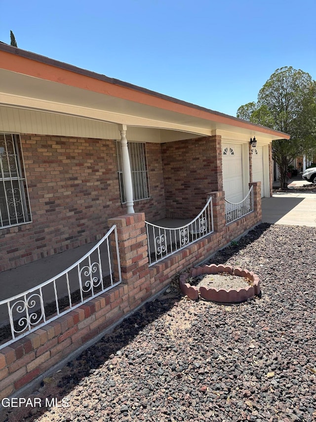 view of side of home with a garage