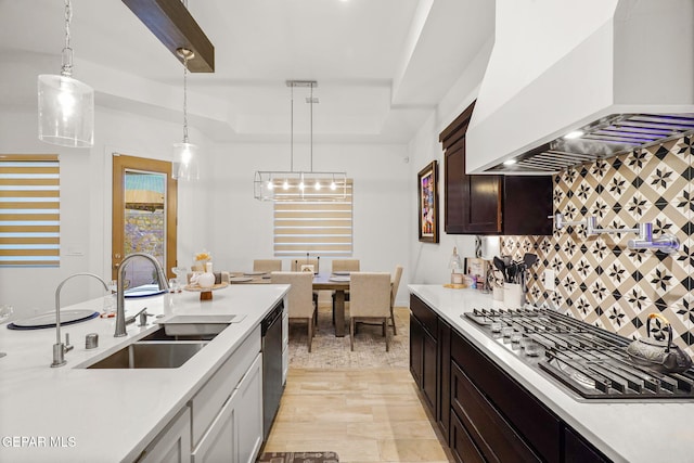 2300 Tierra Zaria, El Paso, TX 79938 - kitchen featuring custom exhaust hood, appliances with stainless steel finishes, light countertops, and decorative backsplash
