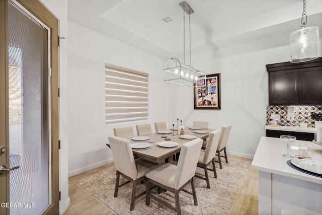 2300 Tierra Zaria, El Paso, TX 79938 - dining room with light wood-type flooring and a chandelier