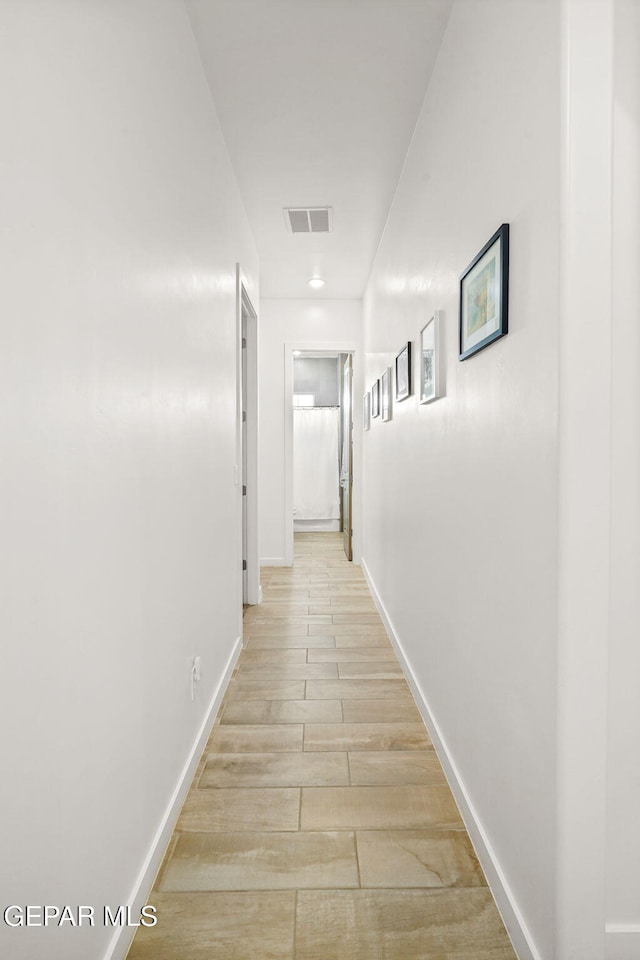 2300 Tierra Zaria, El Paso, TX 79938 - corridor featuring light wood-style flooring and baseboards