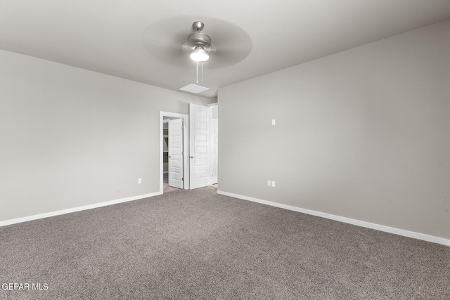 empty room featuring carpet flooring and ceiling fan