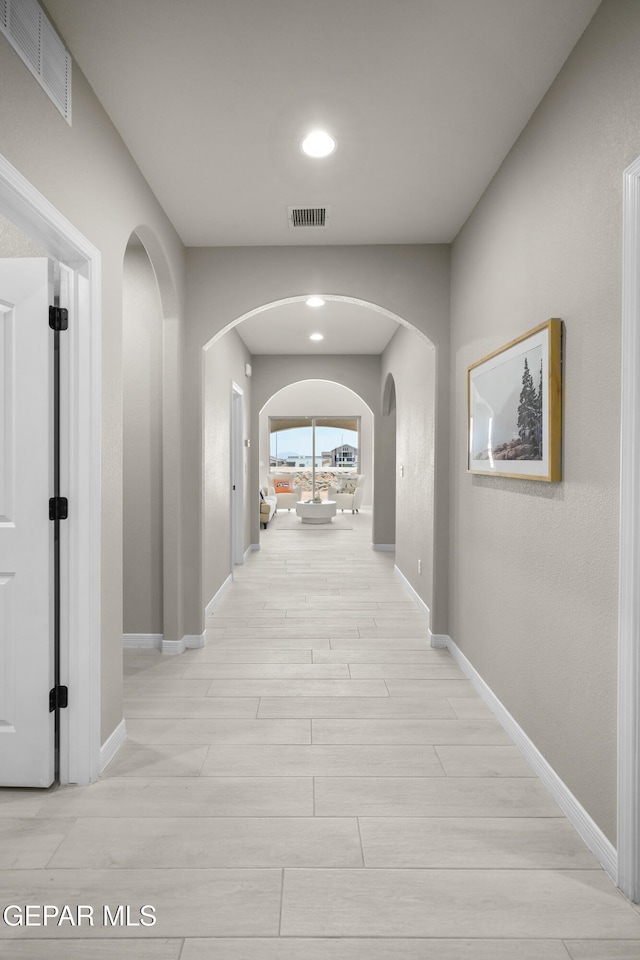 hallway featuring light hardwood / wood-style flooring