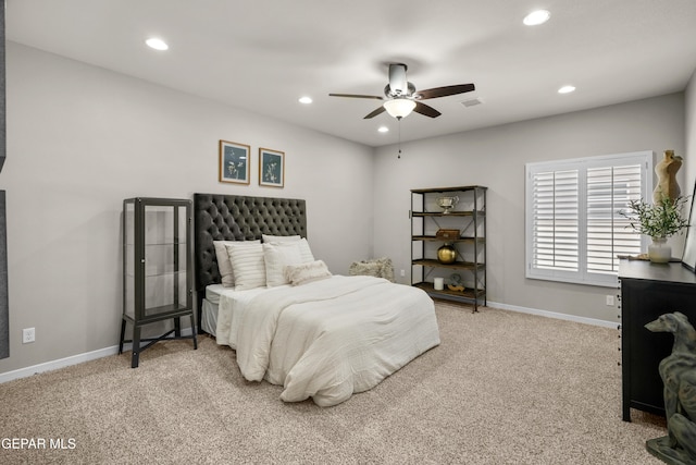 carpeted bedroom featuring ceiling fan