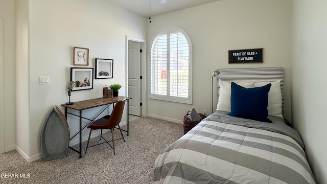 5844 Kobe Bryant St, El Paso, TX 79924 - carpeted bedroom with baseboards
