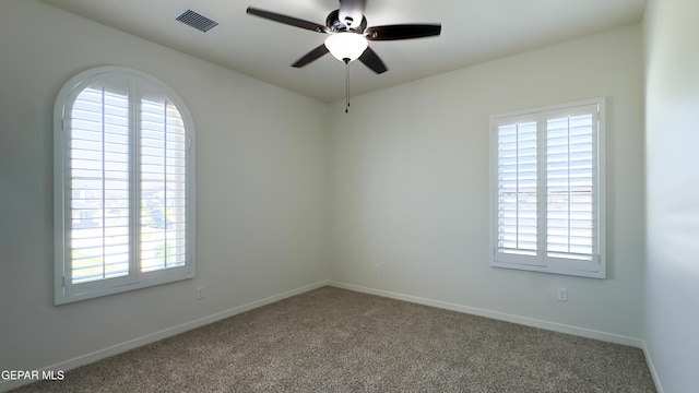 5844 Kobe Bryant St, El Paso, TX 79924 - carpeted empty room featuring healthy amount of natural light, ceiling fan, and baseboards