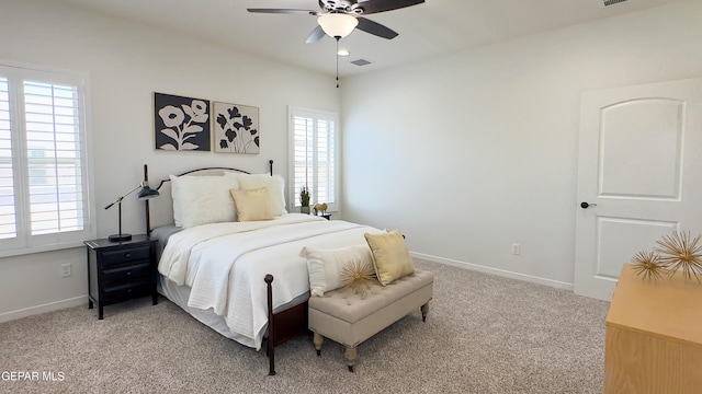5844 Kobe Bryant St, El Paso, TX 79924 - bedroom featuring light carpet, baseboards, and ceiling fan