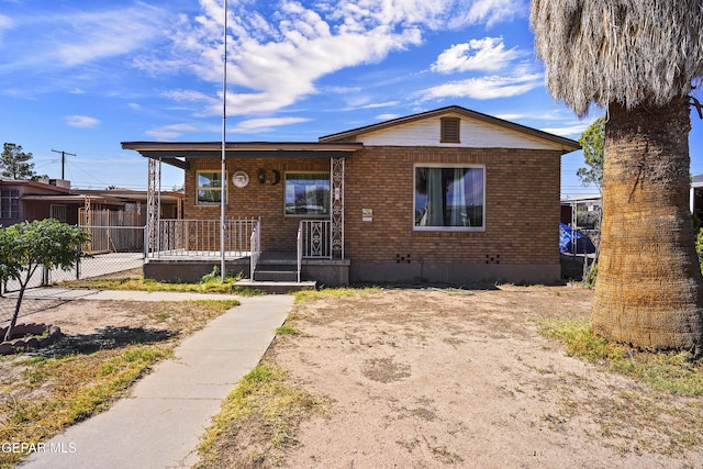 409 Barcelona Dr, El Paso, TX 79905 - view of front of property featuring brick siding and a porch