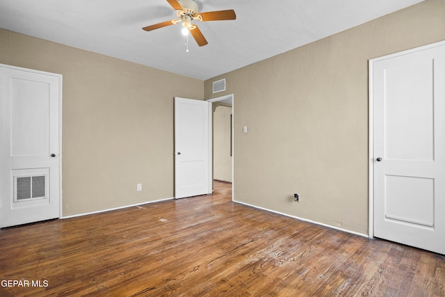 unfurnished bedroom featuring ceiling fan and wood-type flooring