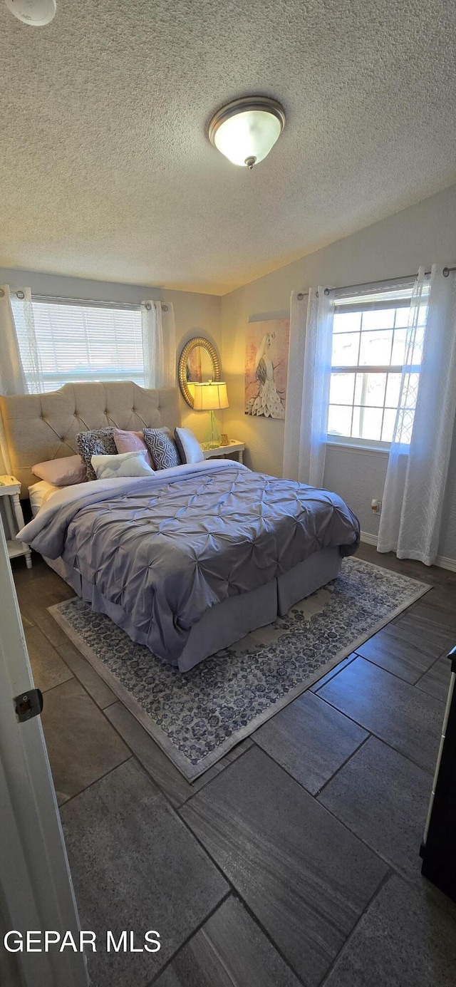 bedroom with a textured ceiling