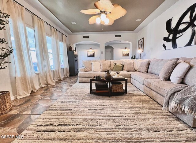 living room with ceiling fan