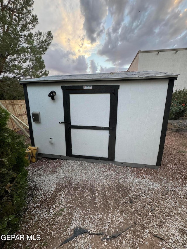 view of outdoor structure at dusk