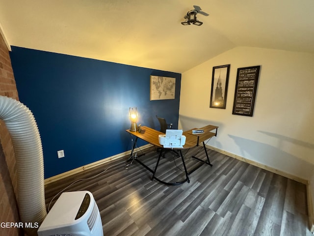 home office featuring lofted ceiling and dark wood-type flooring