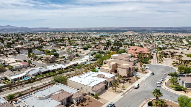 drone / aerial view featuring a mountain view