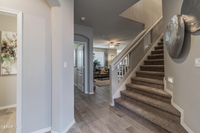 2224 Small Mountain Place, El Paso, TX 79911 - entrance foyer featuring stairs, a ceiling fan, baseboards, and light wood-type flooring