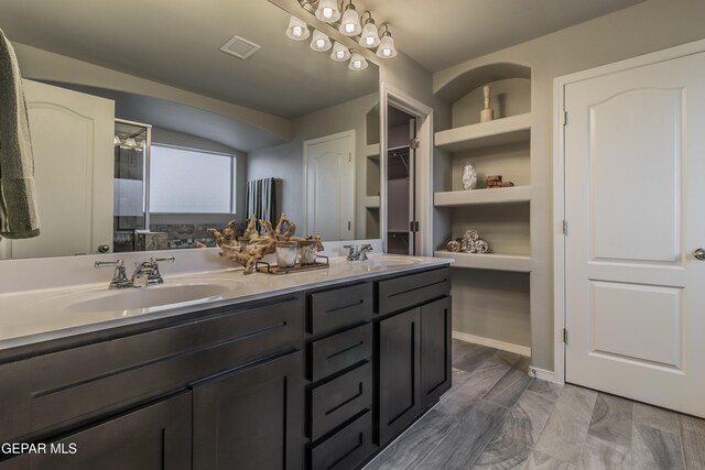 2224 Small Mountain Place, El Paso, TX 79911 - full bathroom featuring double vanity
