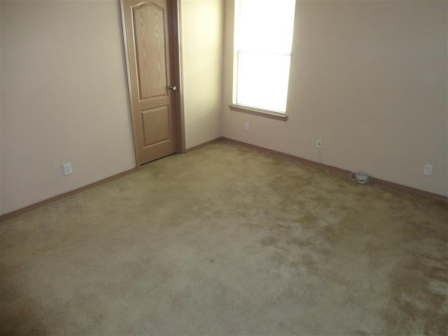 view of carpeted spare room