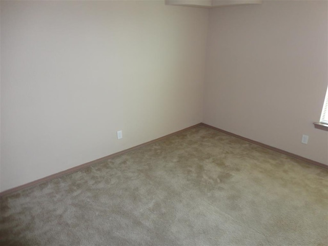 view of carpeted spare room