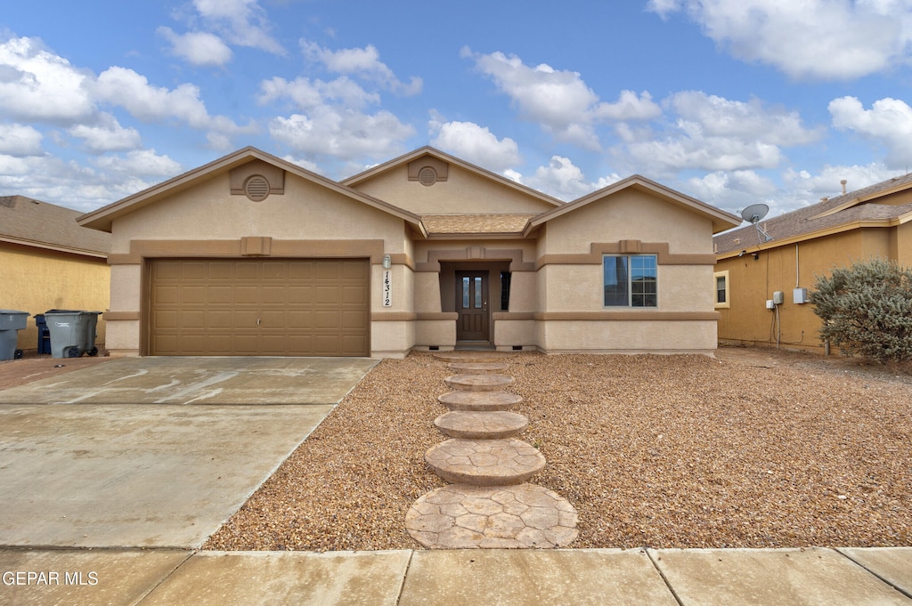 view of front of home with a garage