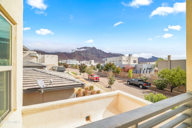 balcony featuring a mountain view