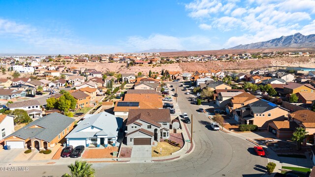 drone / aerial view featuring a mountain view