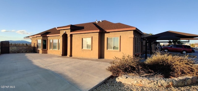 view of front of house featuring a carport