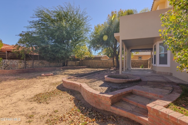 view of yard featuring a patio