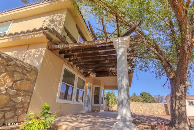 view of home's exterior featuring a patio area