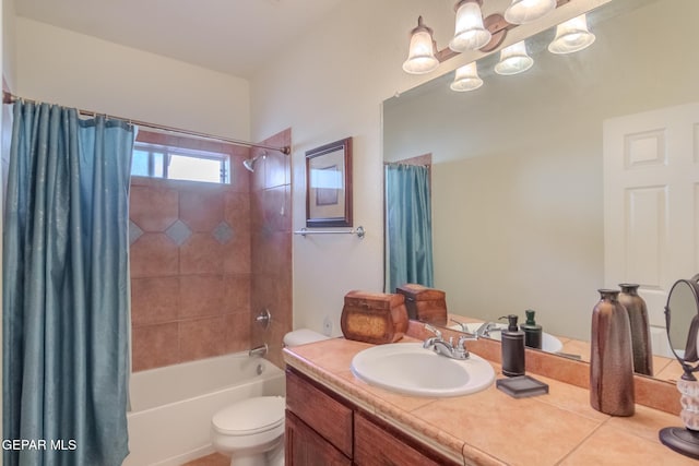 full bathroom with tile patterned flooring, shower / bathtub combination with curtain, a chandelier, vanity, and toilet