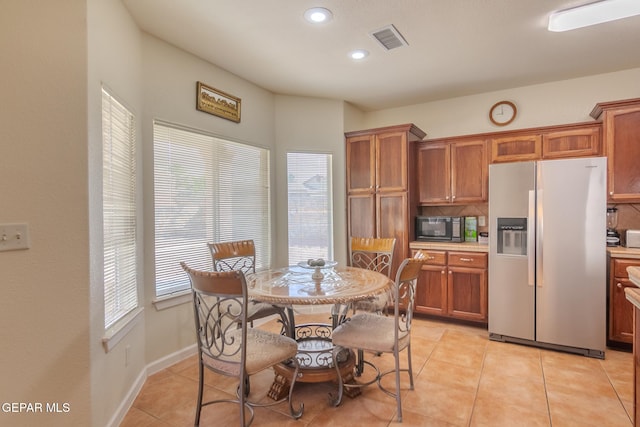 dining room featuring light tile patterned floors