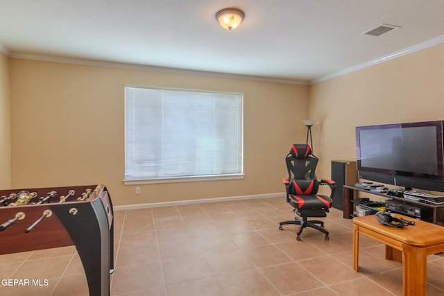 playroom featuring light tile patterned floors and crown molding