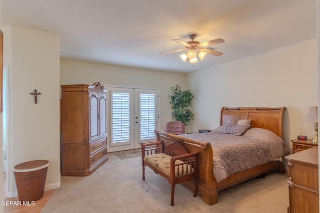 bedroom featuring light colored carpet, ceiling fan, and access to exterior