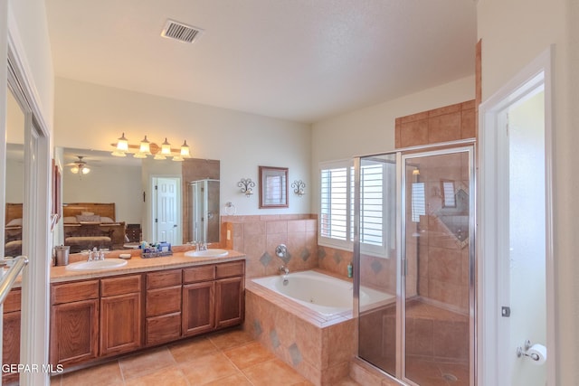 bathroom with vanity, ceiling fan, tile patterned floors, and separate shower and tub