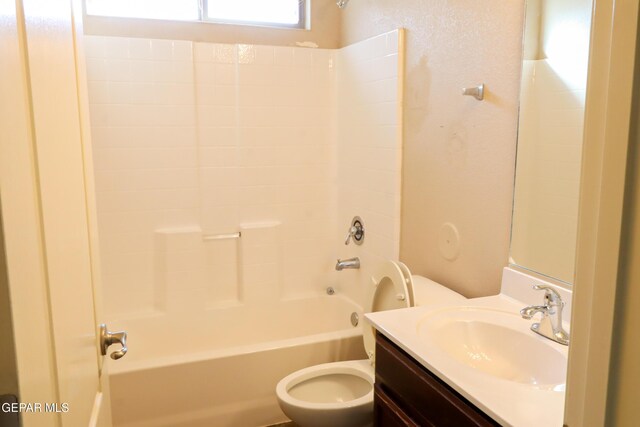 full bathroom featuring toilet, bathtub / shower combination, and vanity