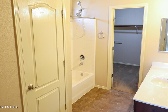 bathroom featuring vanity and shower / bathtub combination