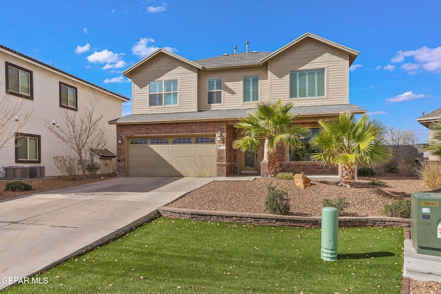 view of front facade featuring a garage, central AC unit, and a front yard