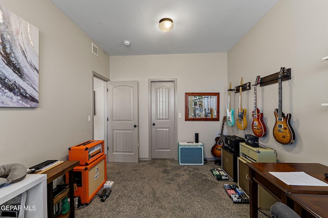 misc room with dark colored carpet