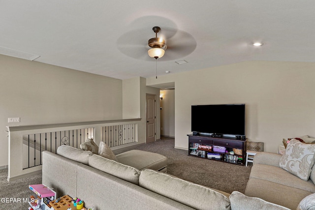 carpeted living room with ceiling fan