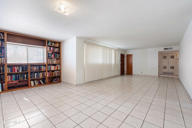 view of tiled spare room