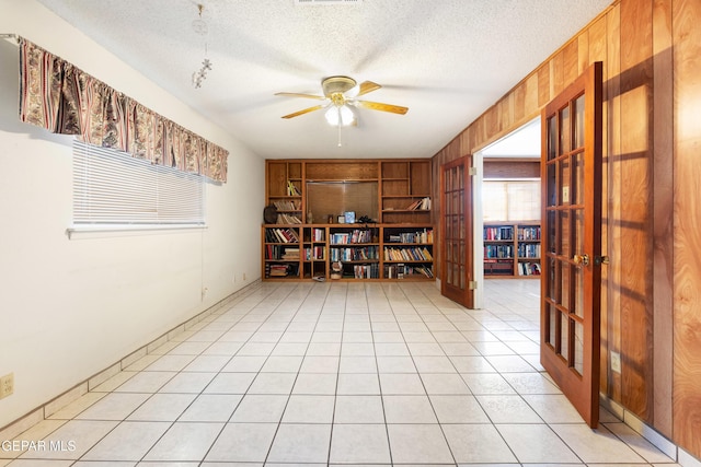3405 Volcanic Ave, El Paso, TX 79904 - empty room featuring a ceiling fan and a textured ceiling