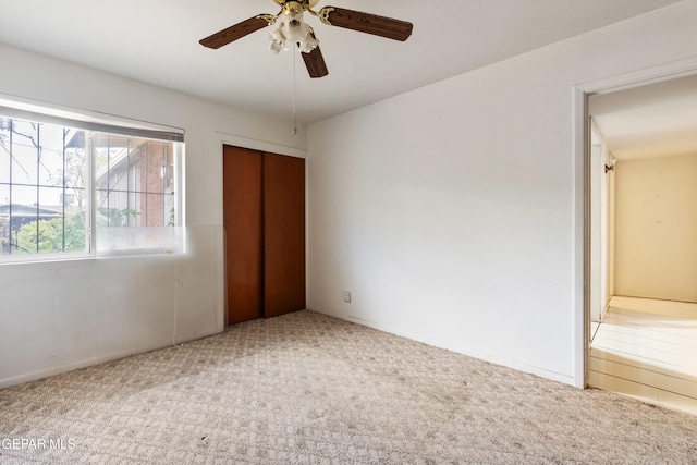 3405 Volcanic Ave, El Paso, TX 79904 - unfurnished bedroom with carpet floors, a closet, a ceiling fan, and baseboards