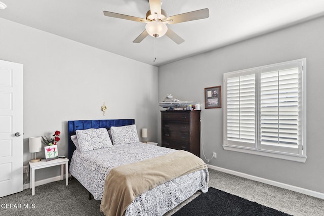 carpeted bedroom with ceiling fan