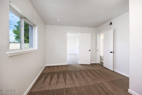 view of carpeted spare room