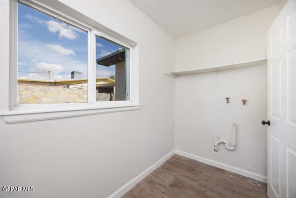 laundry room featuring dark hardwood / wood-style flooring